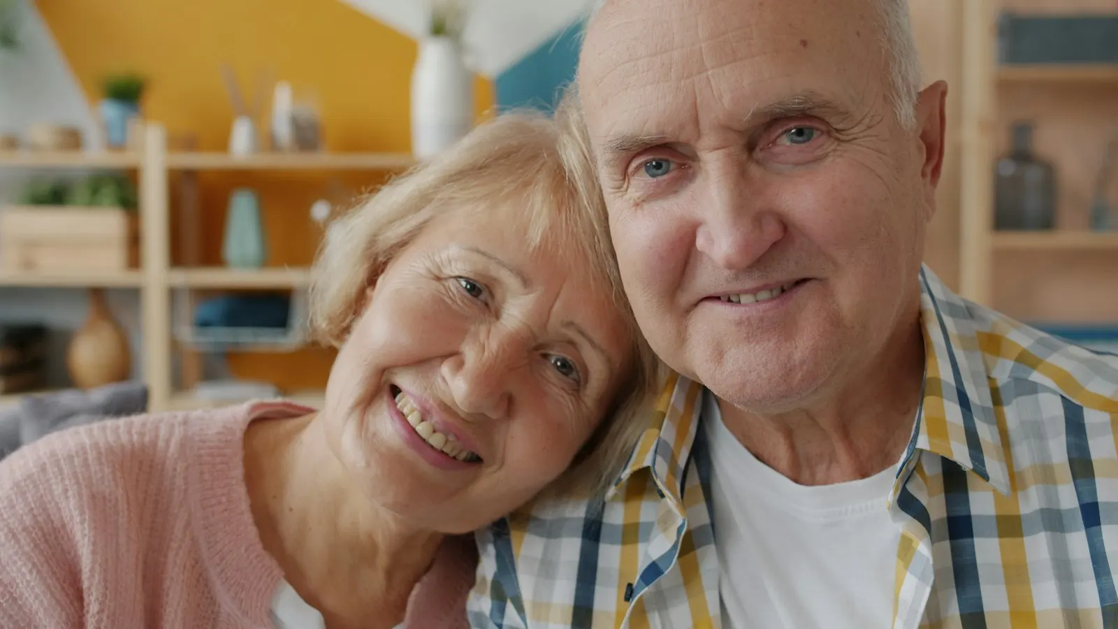 Smiling older couple at home